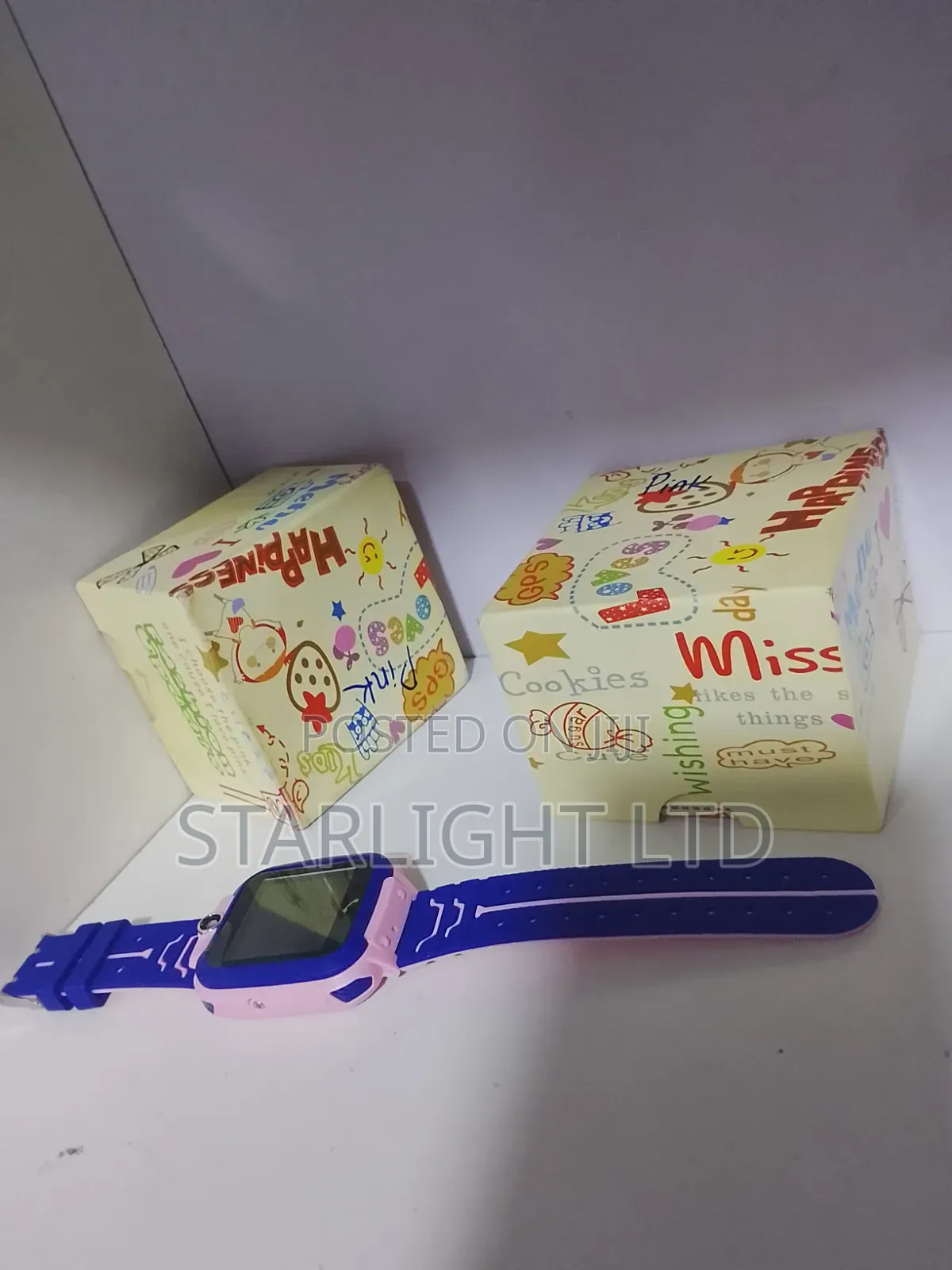 Vibrant Purple Kids Smartwatch and Novelty Display Packaging
