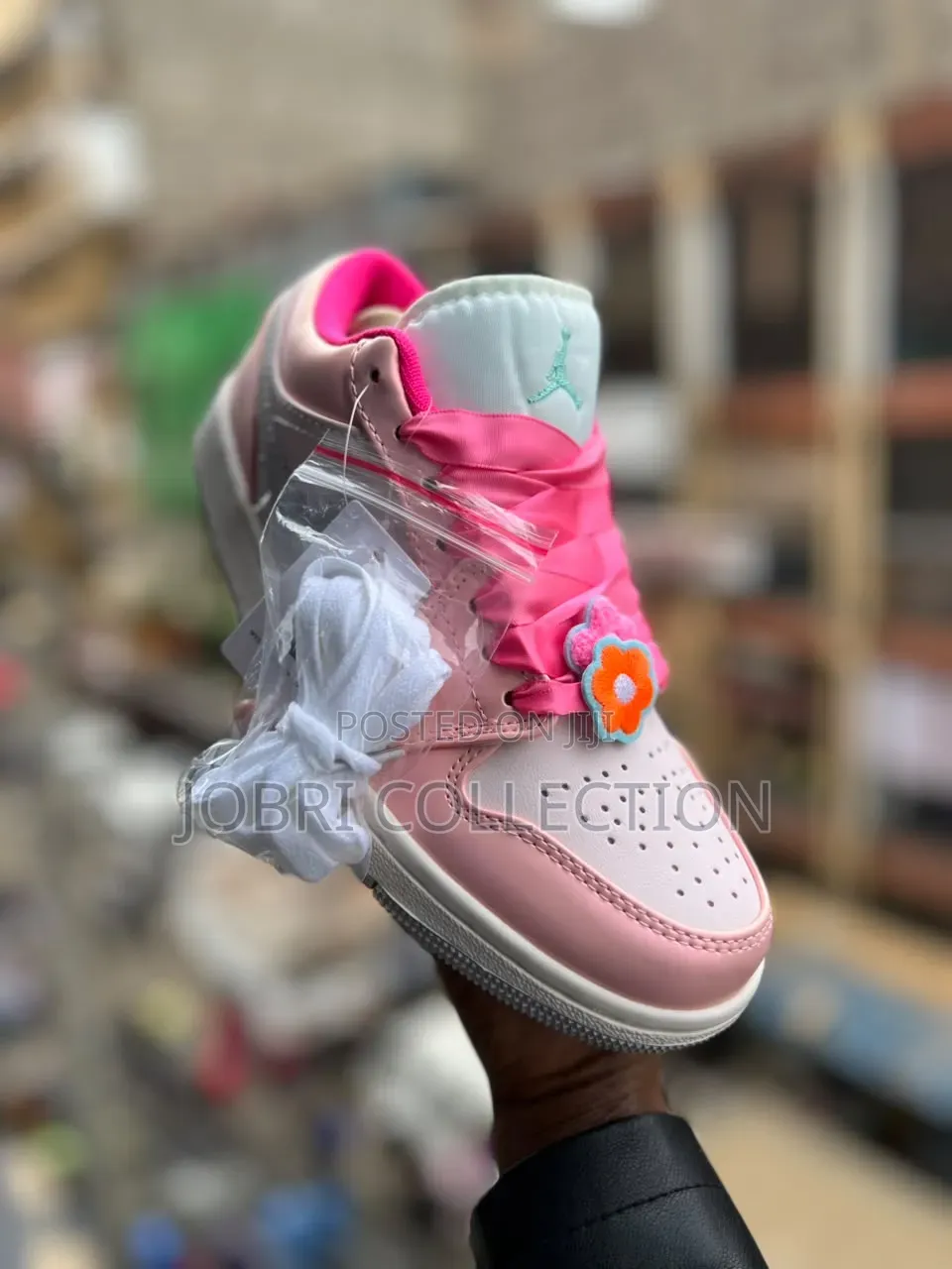 Ladies Nike Jordan 1 Low “Pink Bloom” Sneakers