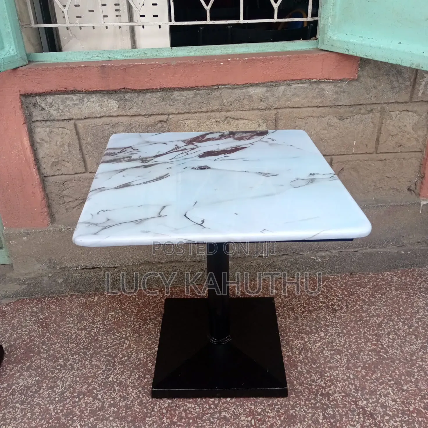 White Eboxy Tables With Hooks to Hang Handbags