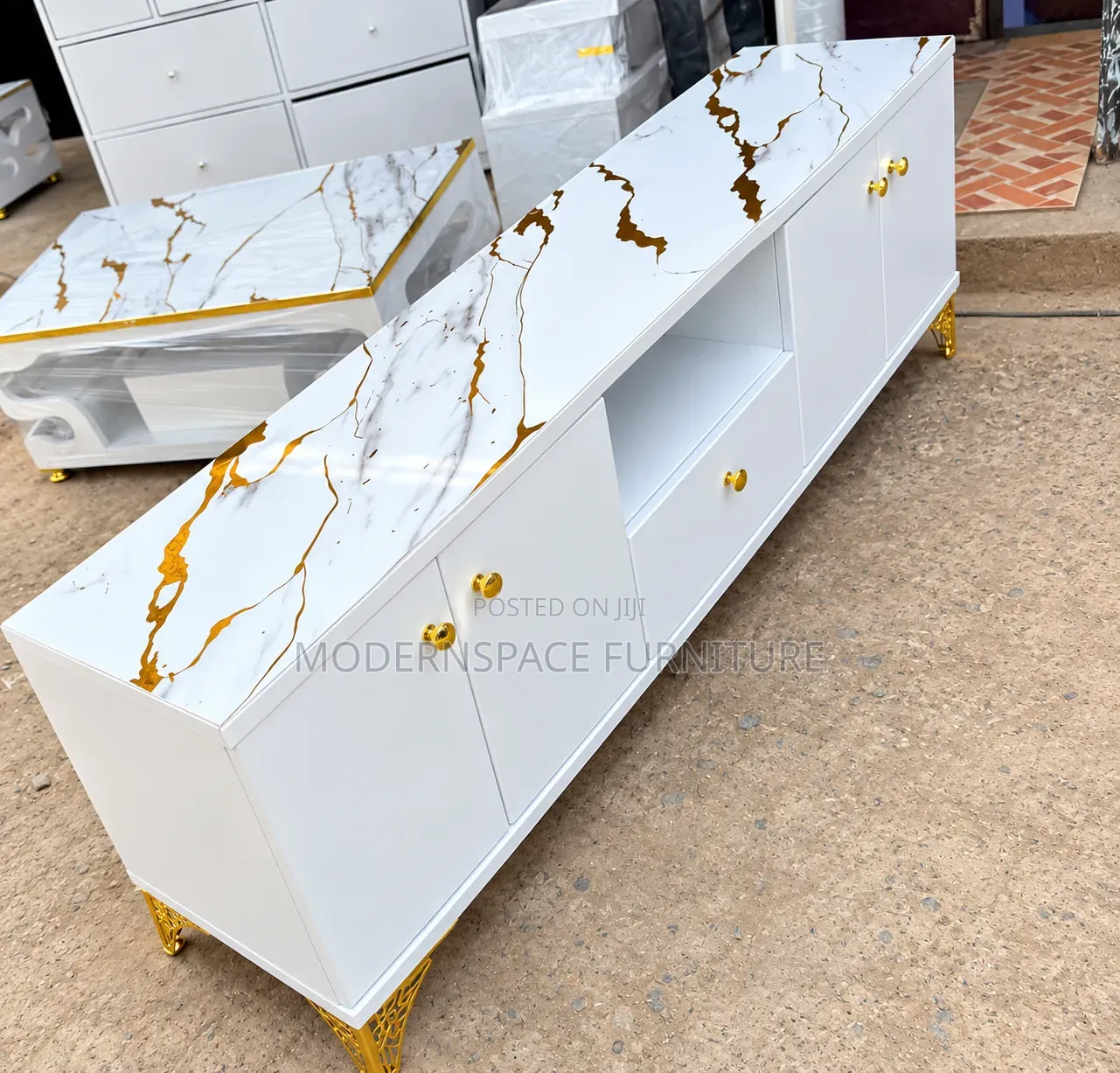Modern White TV Stand With Gold Marble Design