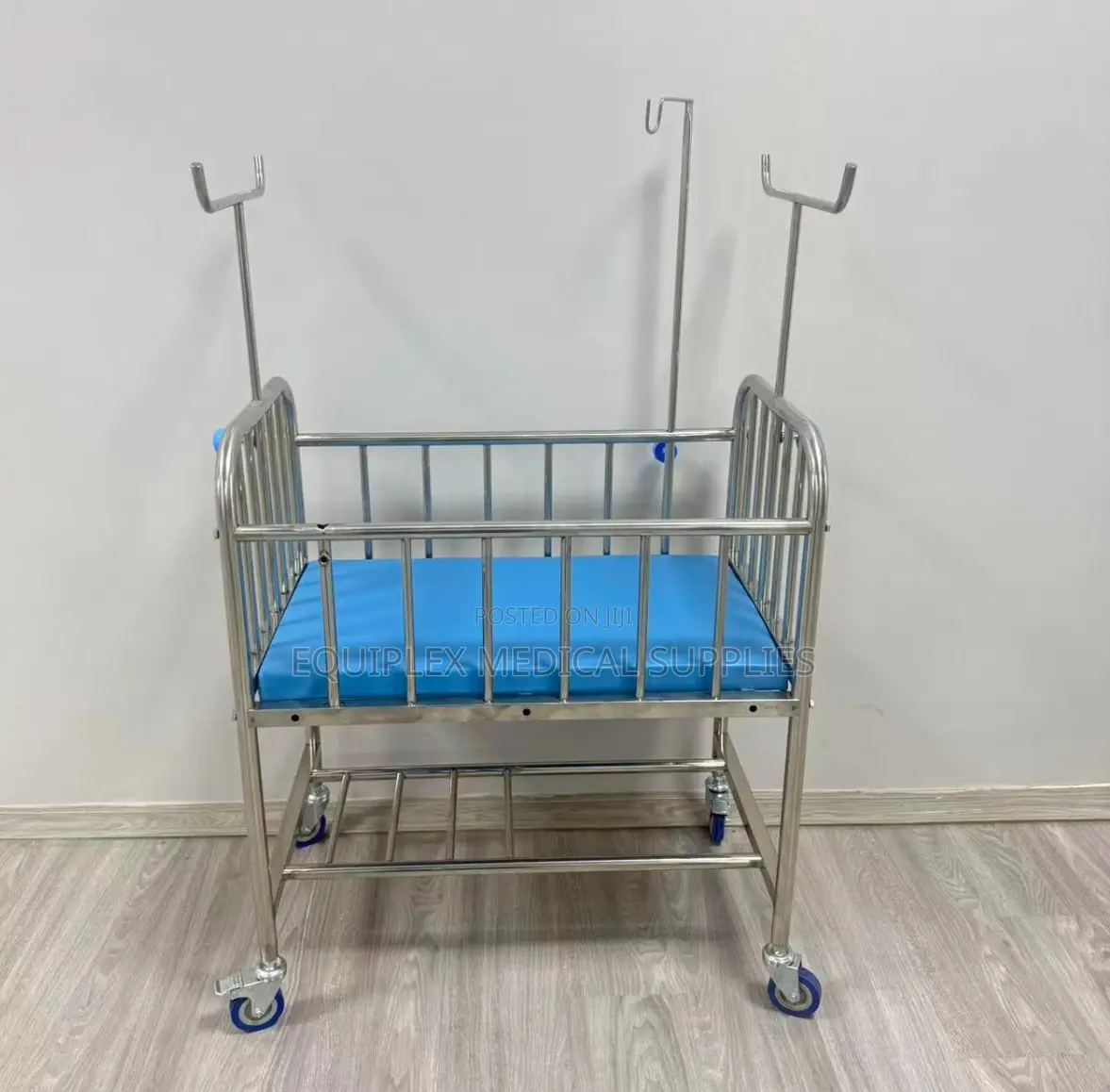 Hospital Blue Imported Baby Cot With Wheels (Stainless Steel)