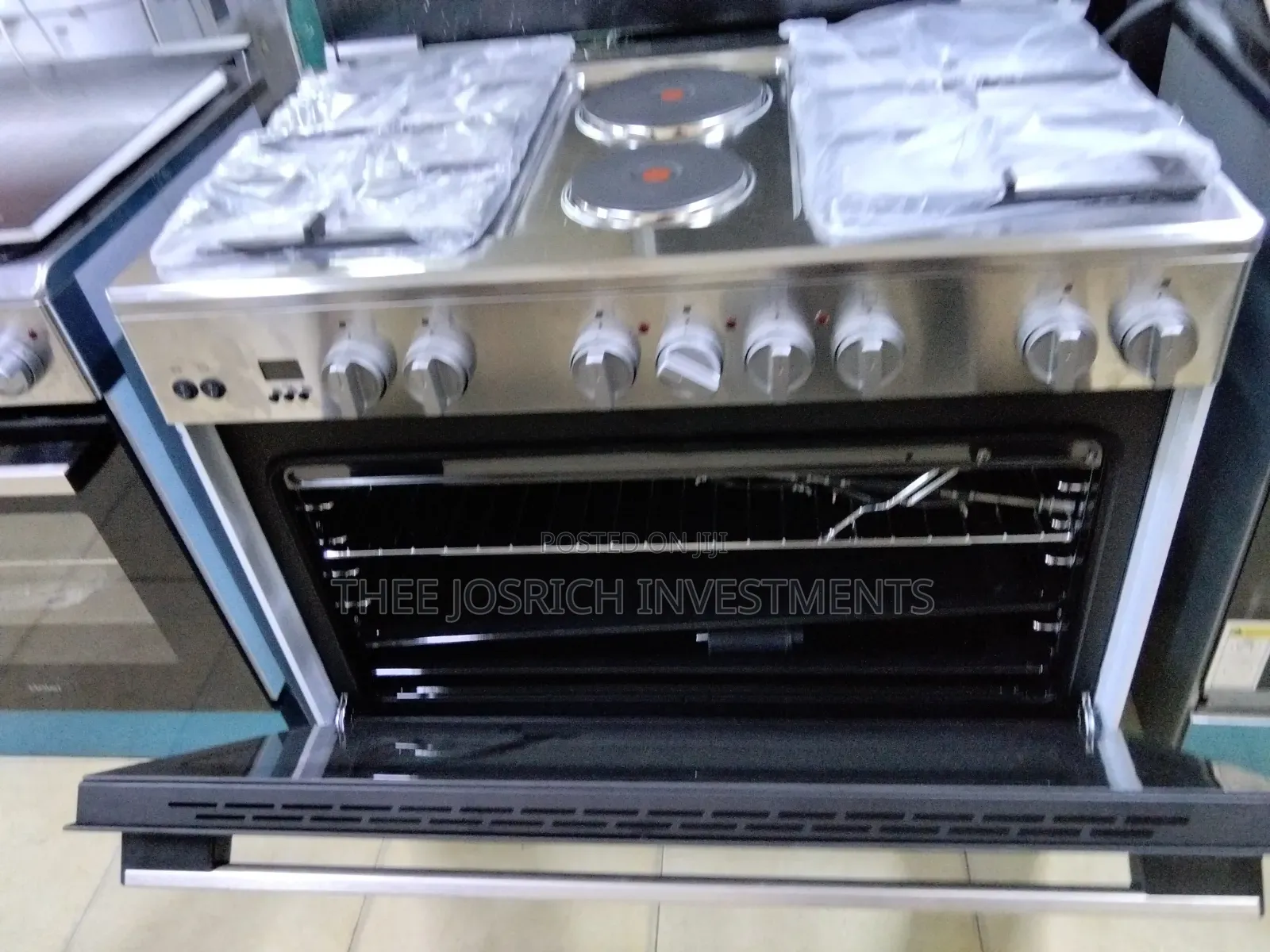 Haier 4 Gas + 2 Hot Rapid Plates With Wok Burner Rotisserie Turbo Fan
