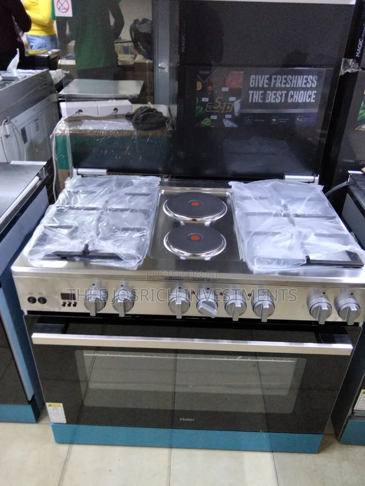 Haier 4 Gas + 2 Hot Rapid Plates With Wok Burner Rotisserie Turbo Fan