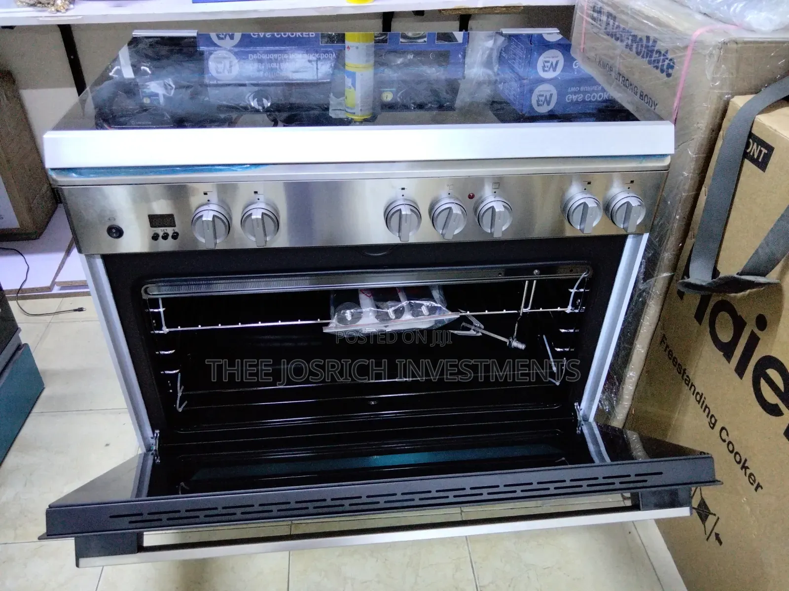 Haier 4 Gas + 2 Hot Rapid Plates With Wok Burner Rotisserie Turbo Fan