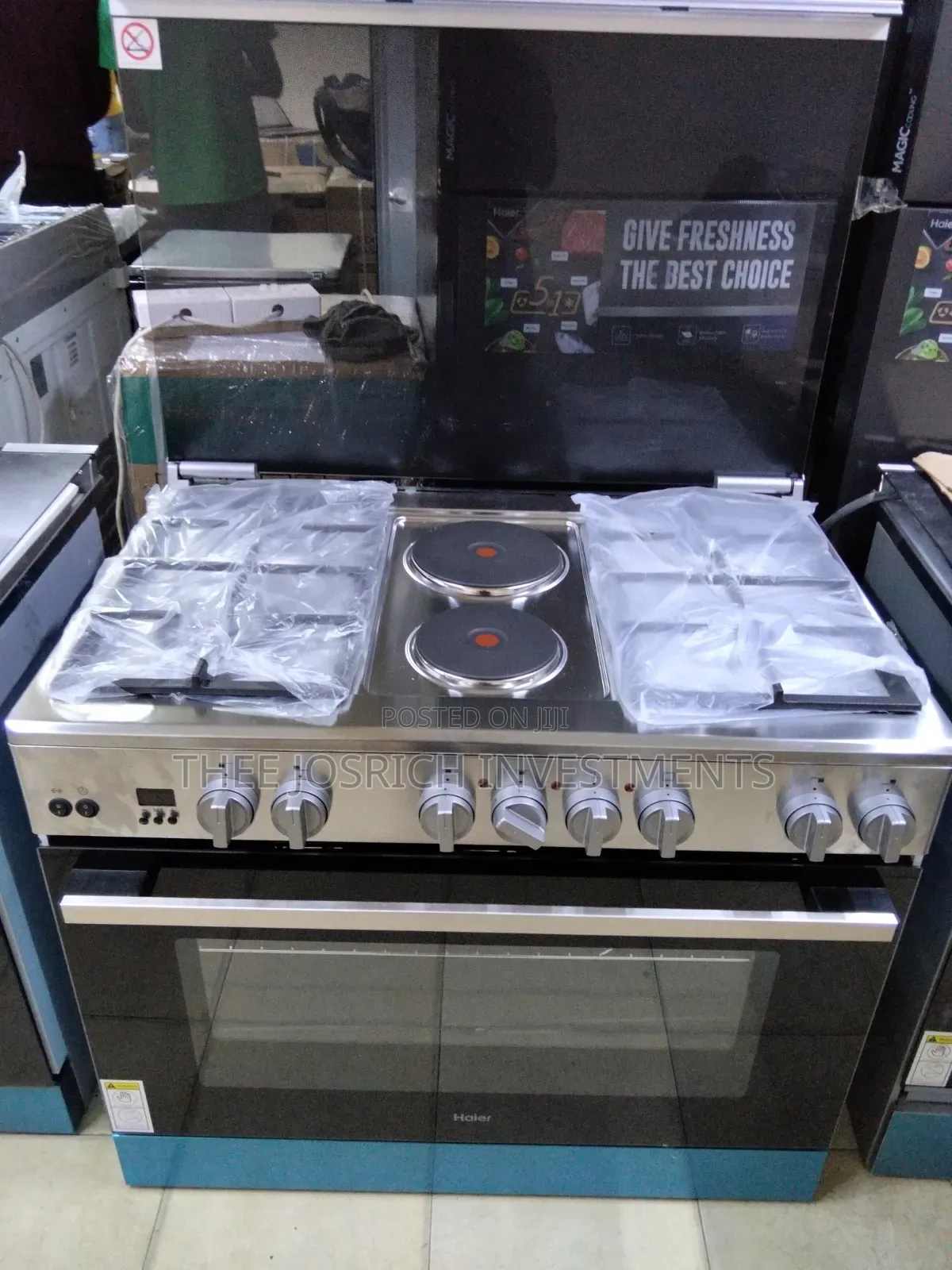 Haier 4 Gas + 2 Hot Rapid Plates With Wok Burner Rotisserie Turbo Fan