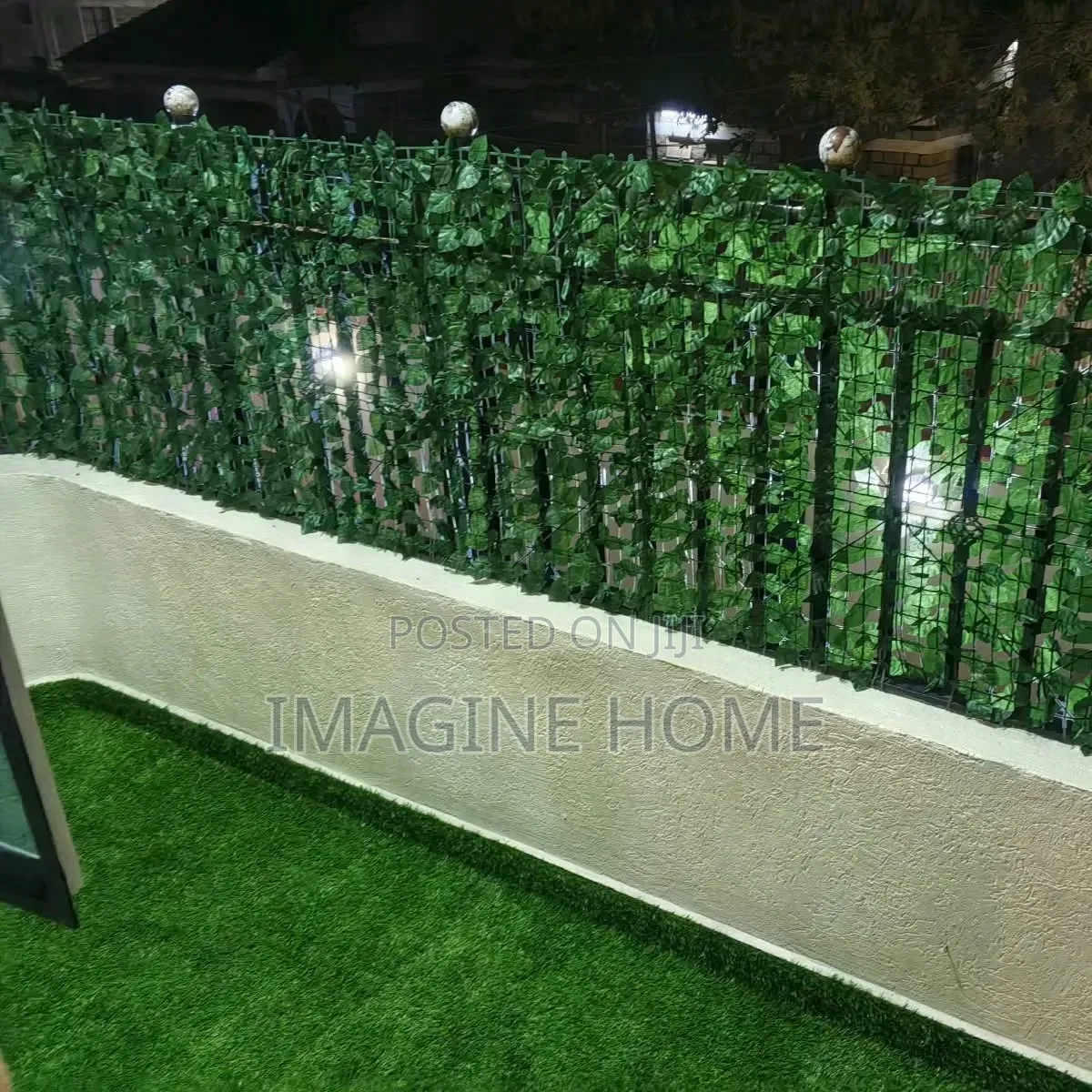 Relaxing Outdoor Space With Green Fences/Grass Carpet