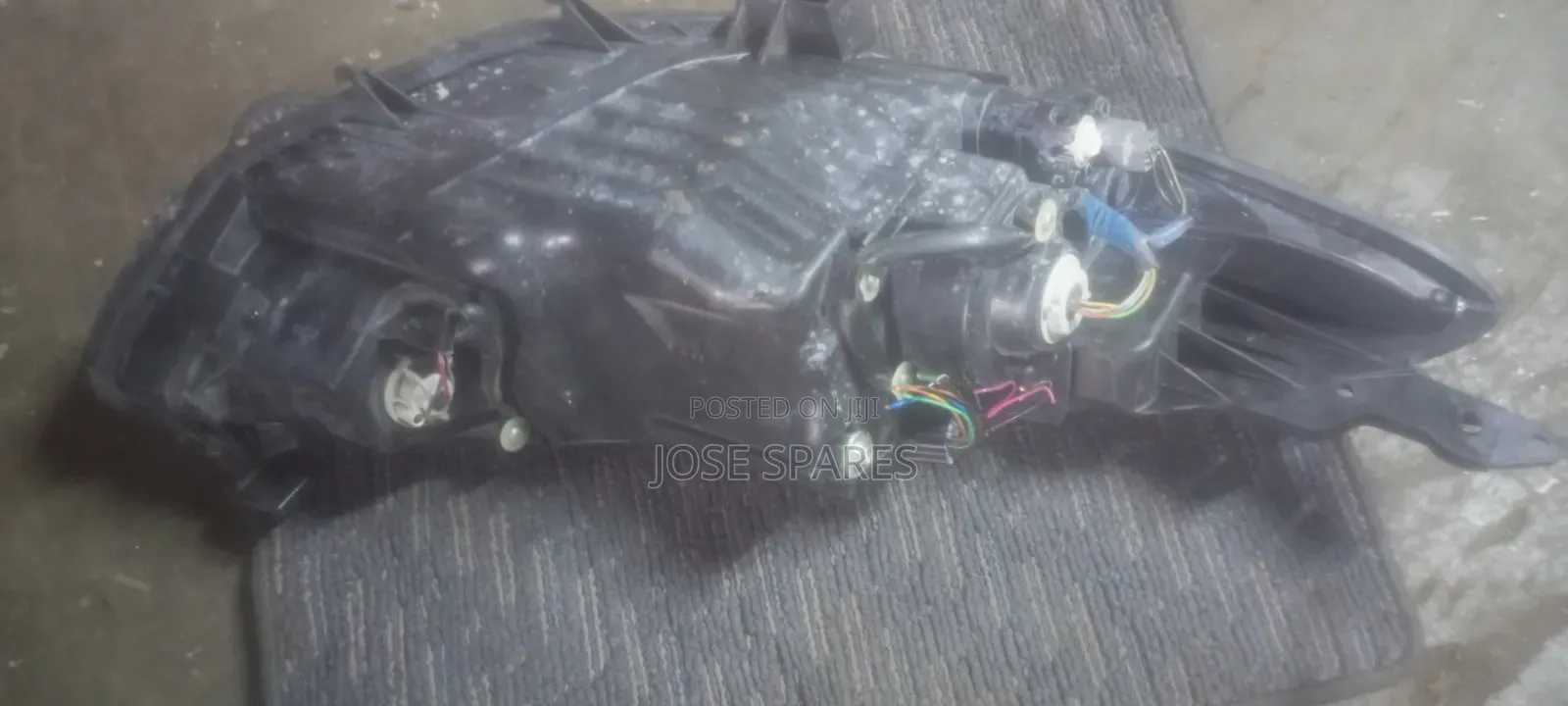 Mazda Demio Headlight