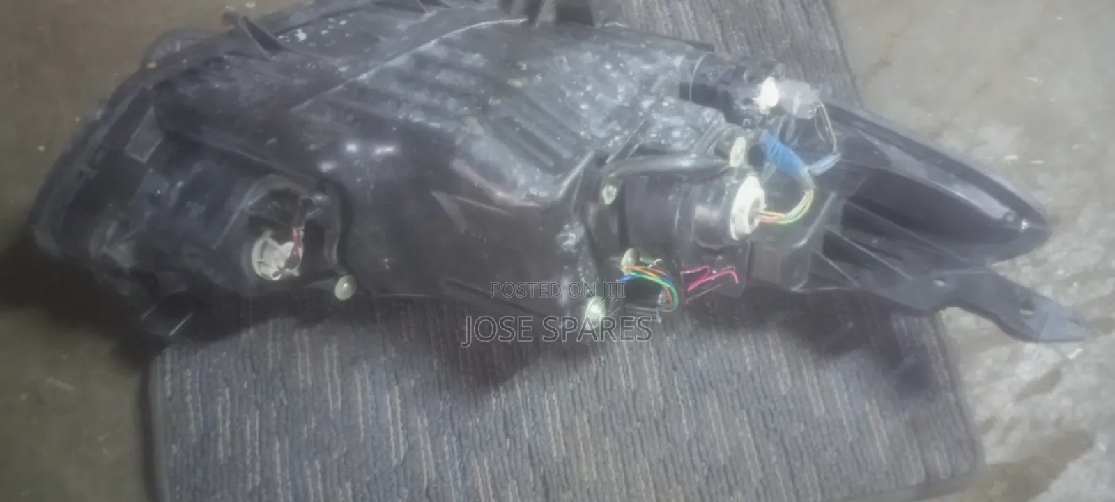 Mazda Demio Headlight