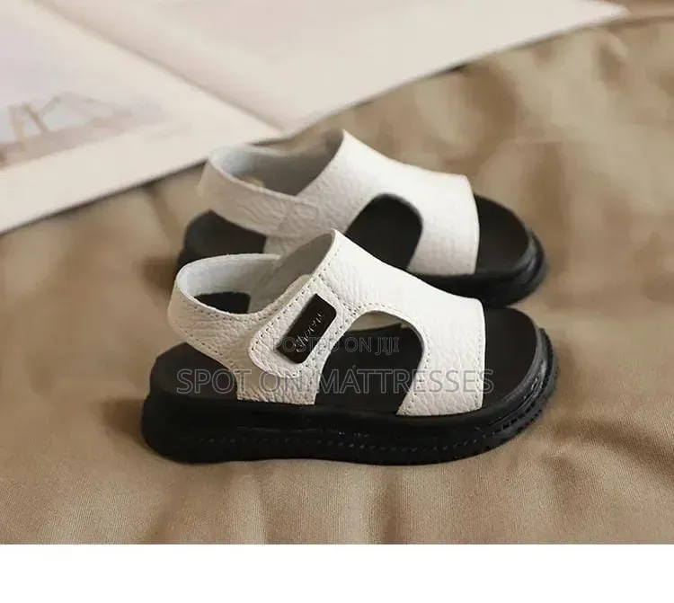Sandals/Opens for Baby Boys. Sizes 21-36. Black and White Available.