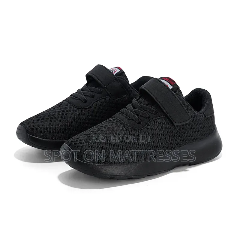 Unisex Breathable Sneakers. Sizes 28-40. Colours Black/Pink.