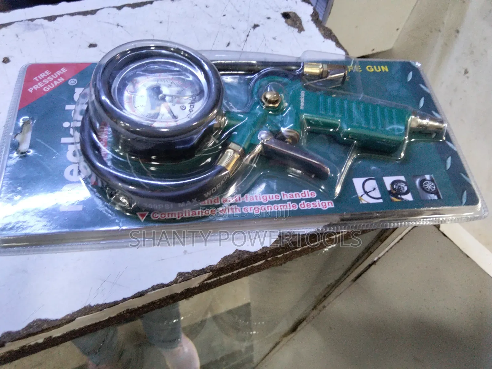 Tire Pressure Inflator Gun With a Pressure Gauge.
