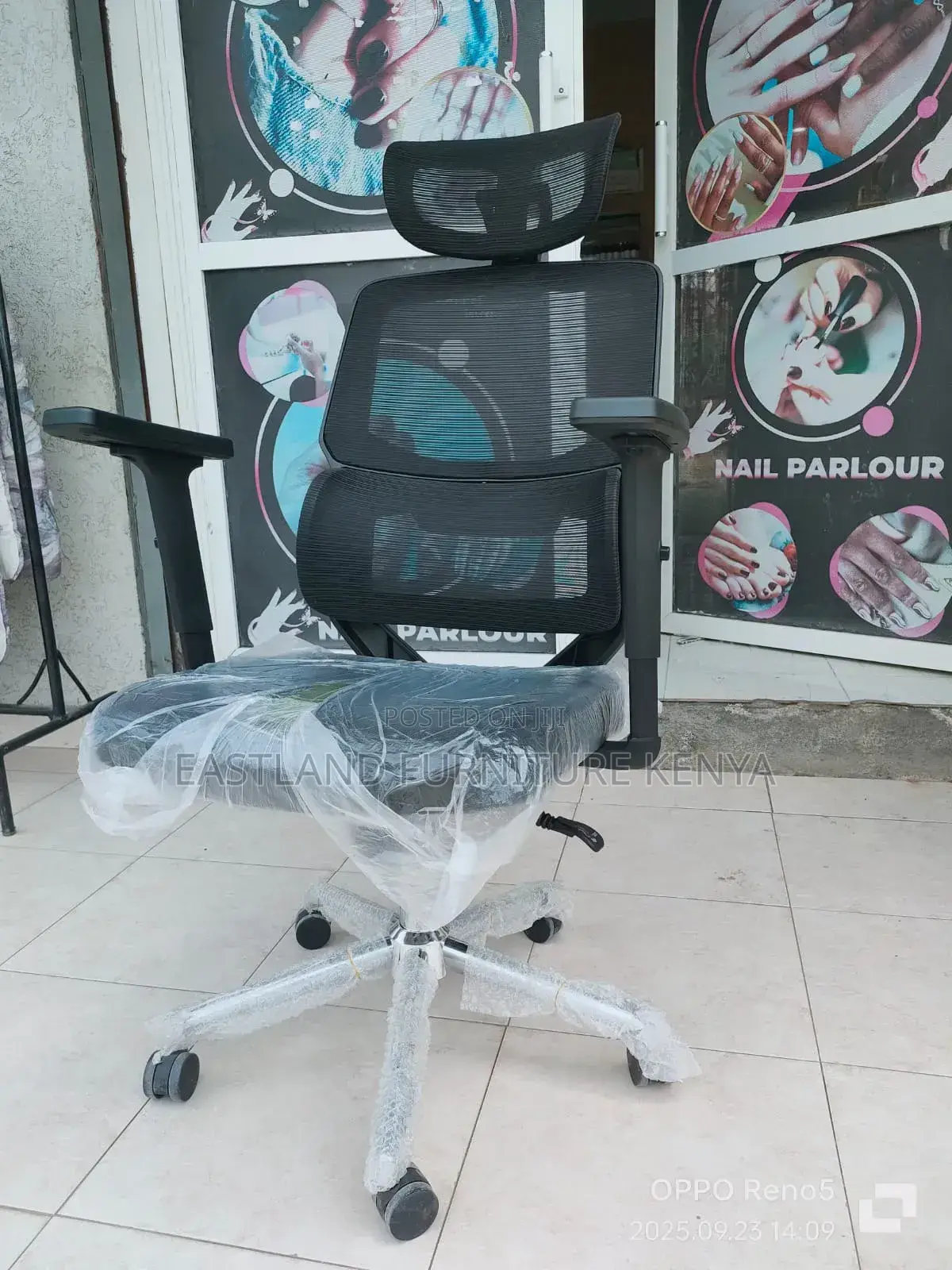Ergonomic Mesh Office Chair With Adjustable Headrest & Armrests