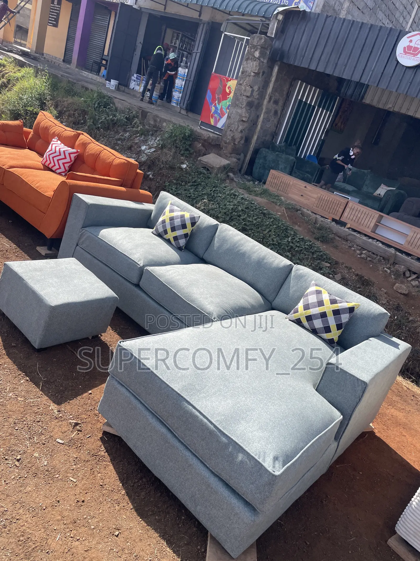 A Sage Green L Shape Couch