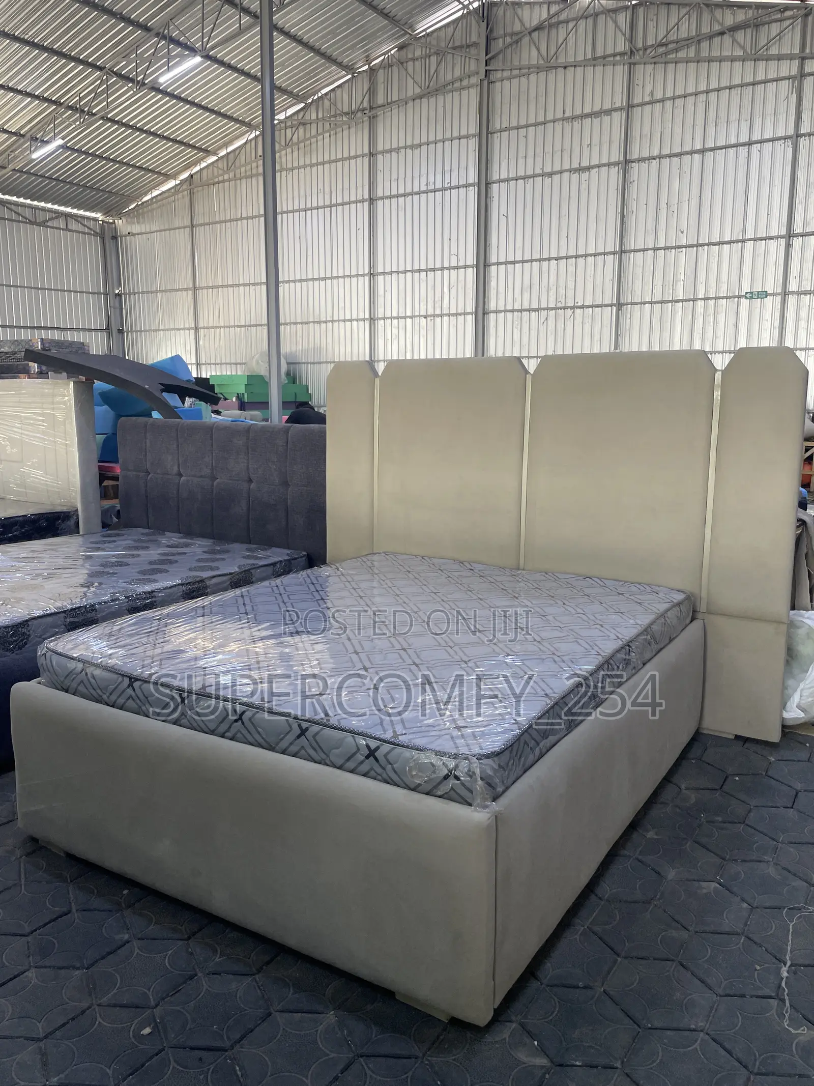 A Fancy Extended Headboard King Size Bed
