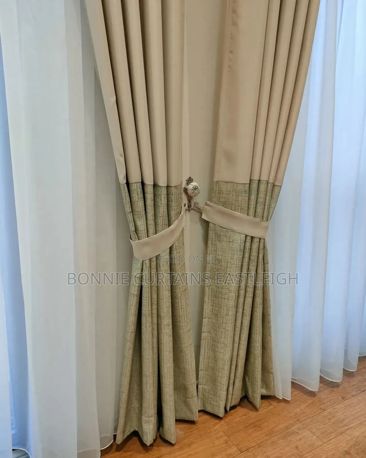 Blue Curtains and Gold Sheers With Rings