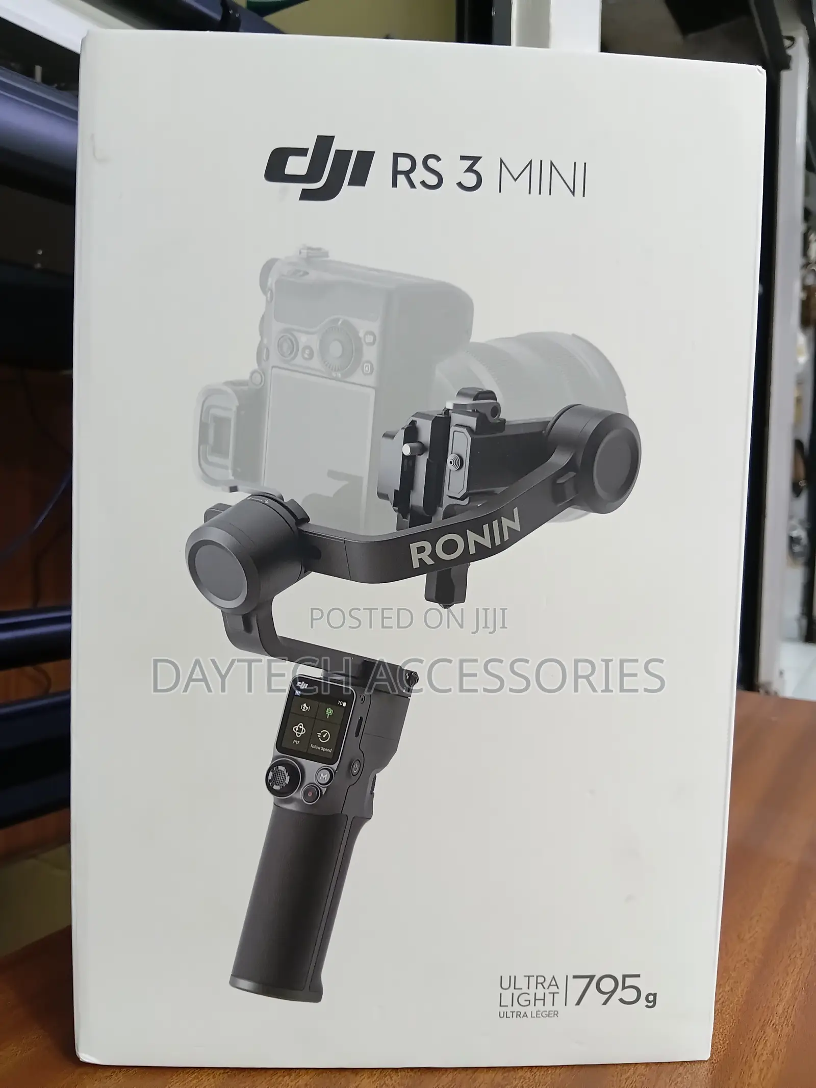The DJI RS 3 Mini 3-Axis Handheld Gimbal Stabilizer.
