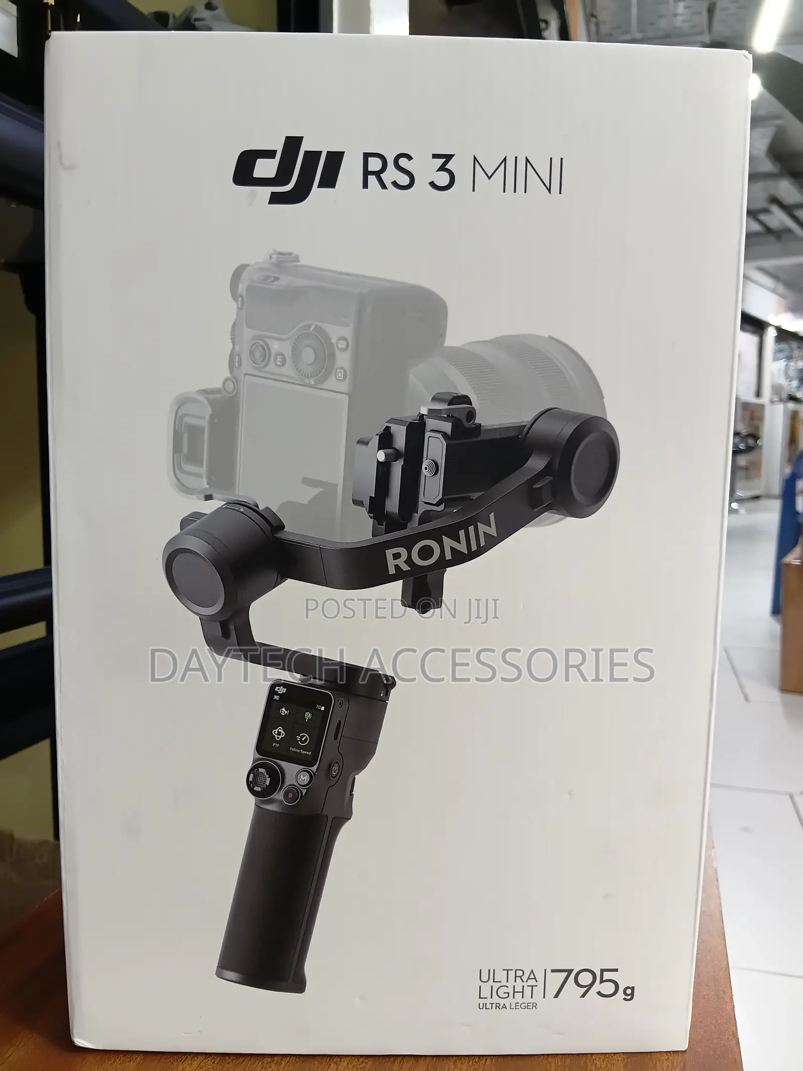 The DJI RS 3 Mini 3-Axis Handheld Gimbal Stabilizer.