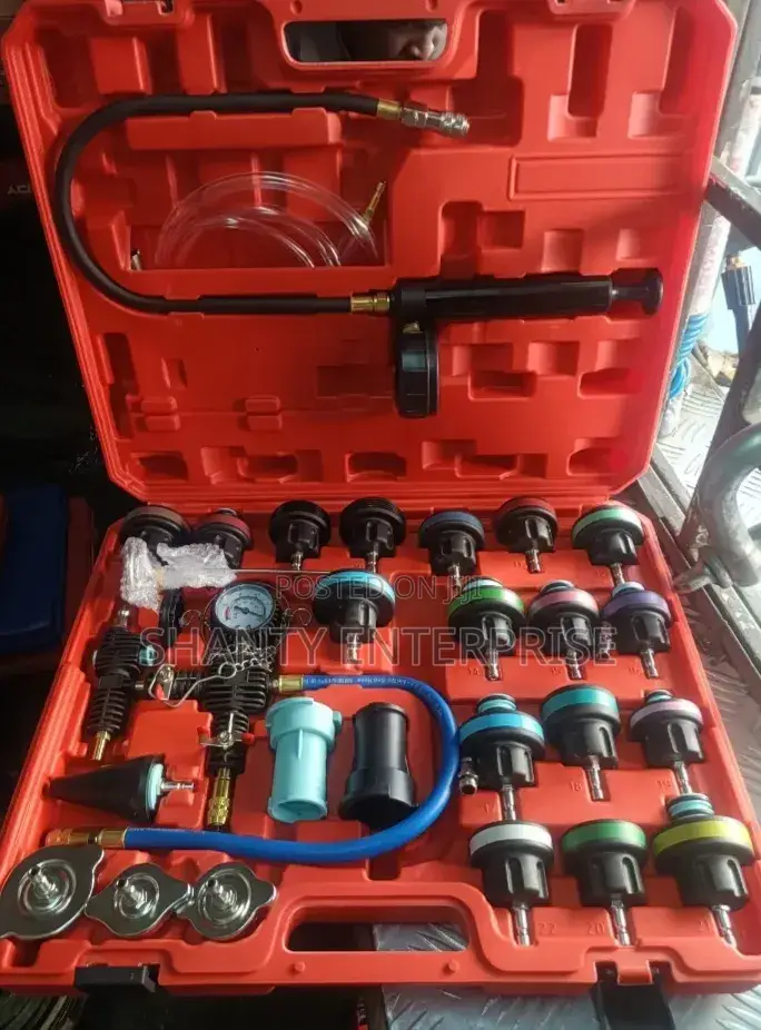 Radiator Pressure Tester and Vacuum-Type Cooling System Refill Kit.
