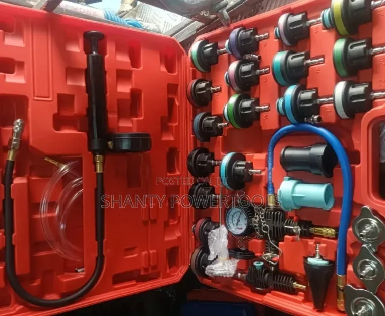 Radiator Pressure Tester and Vacuum-Type Cooling System Refill Kit.