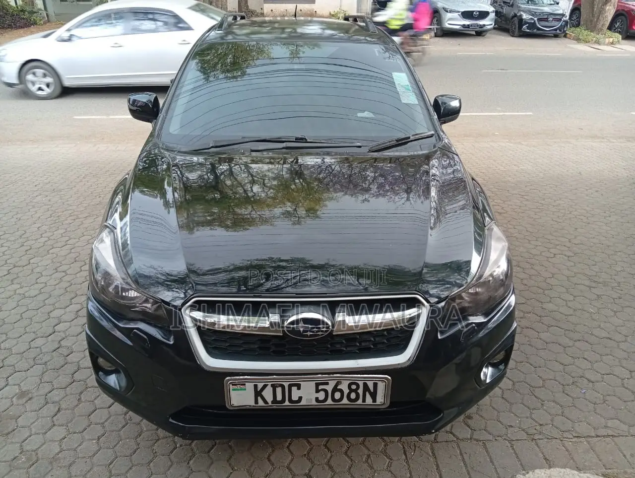 Subaru Impreza 2.0i Limited PZEV 4dr Hatchback AWD (2.0L 4cyl CVT) 2014