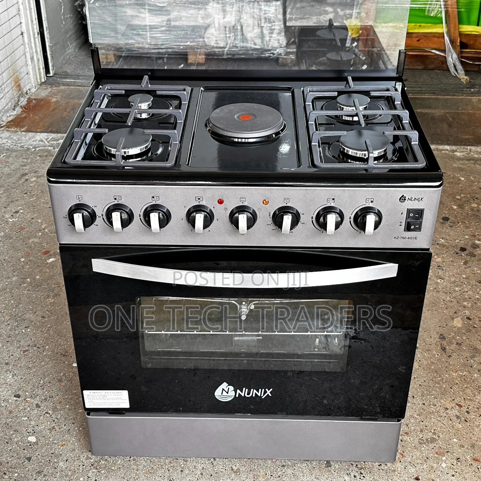 60 by 80 Nunix Standing Cooker 4gas + 1 Electric
