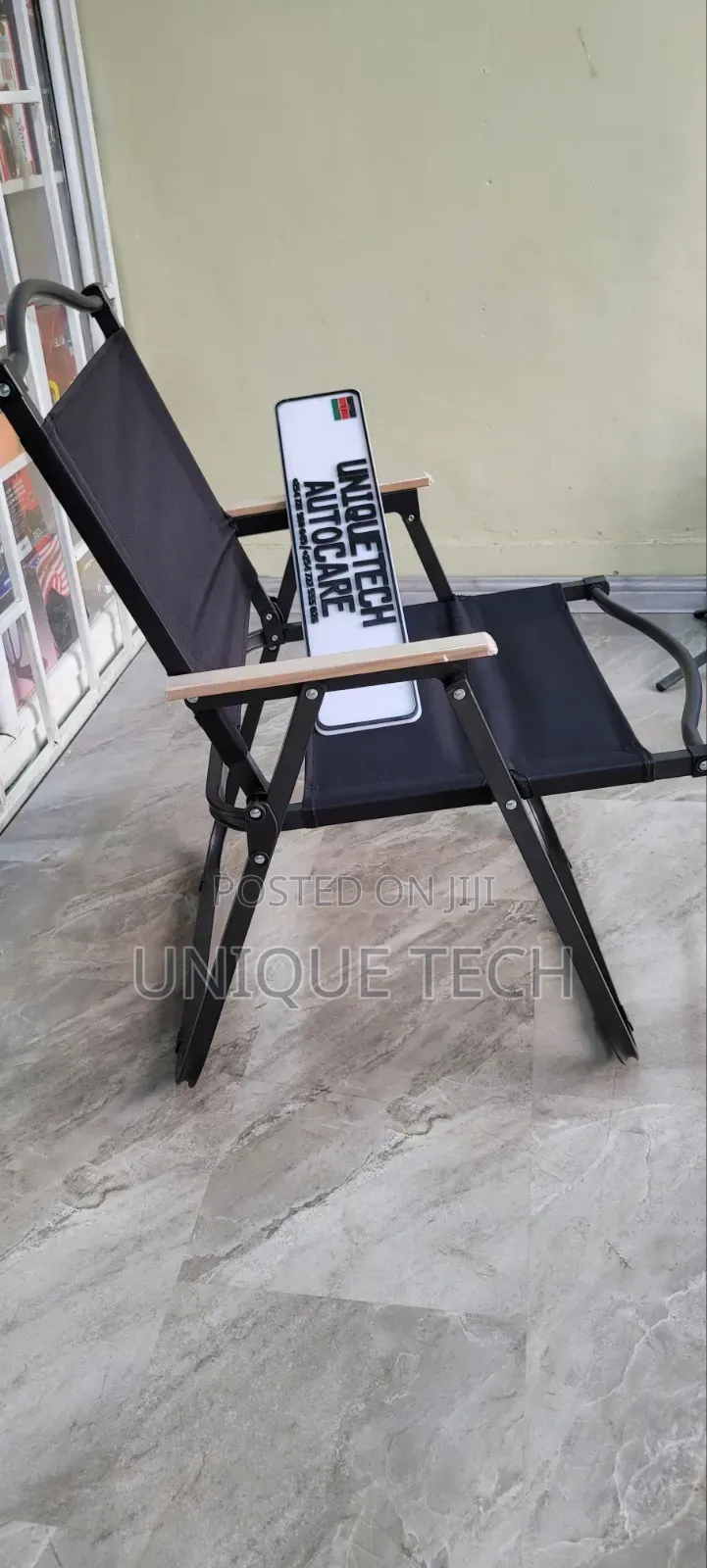Black Portable Outdoor Chair With Light Wooden Armrests