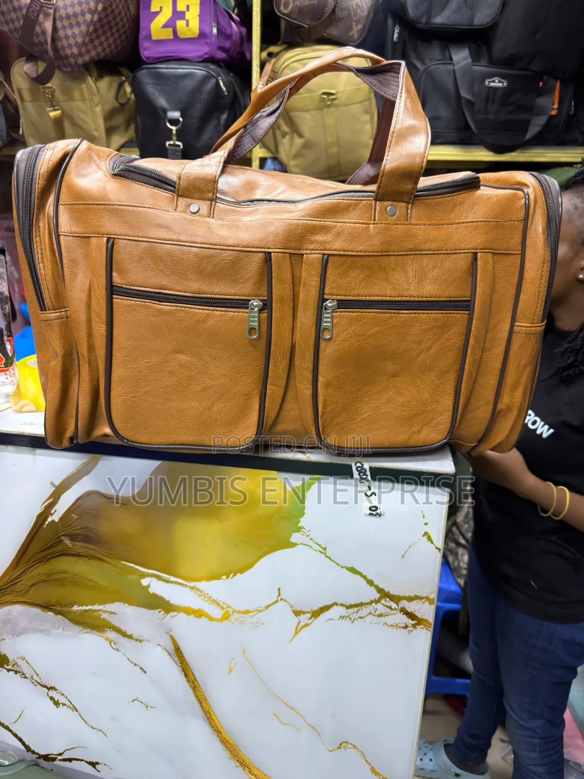Pockeys Well Partitioned Brown Duffle Bags