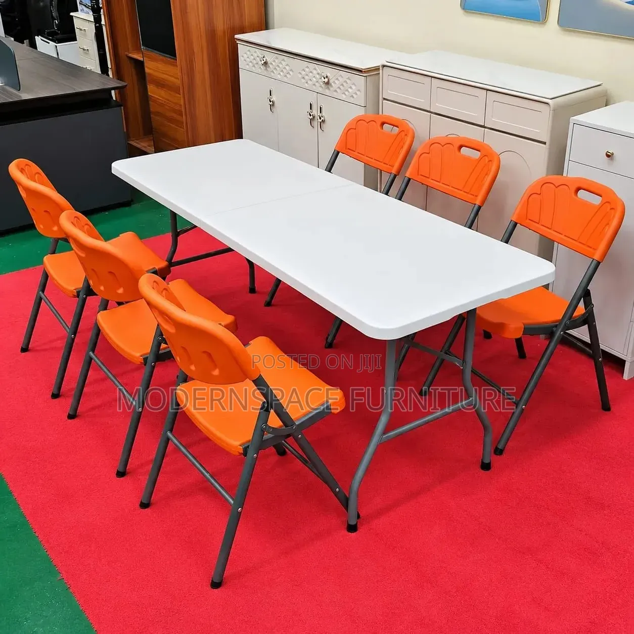 Folding Table With Orange Chairs (New