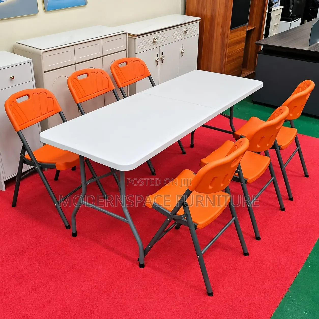 Folding Table With Orange Chairs (New
