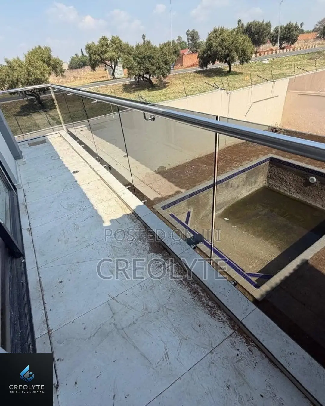 Stainless Steel & Tinted Glass Balcony Railing | Custom Balustrade |