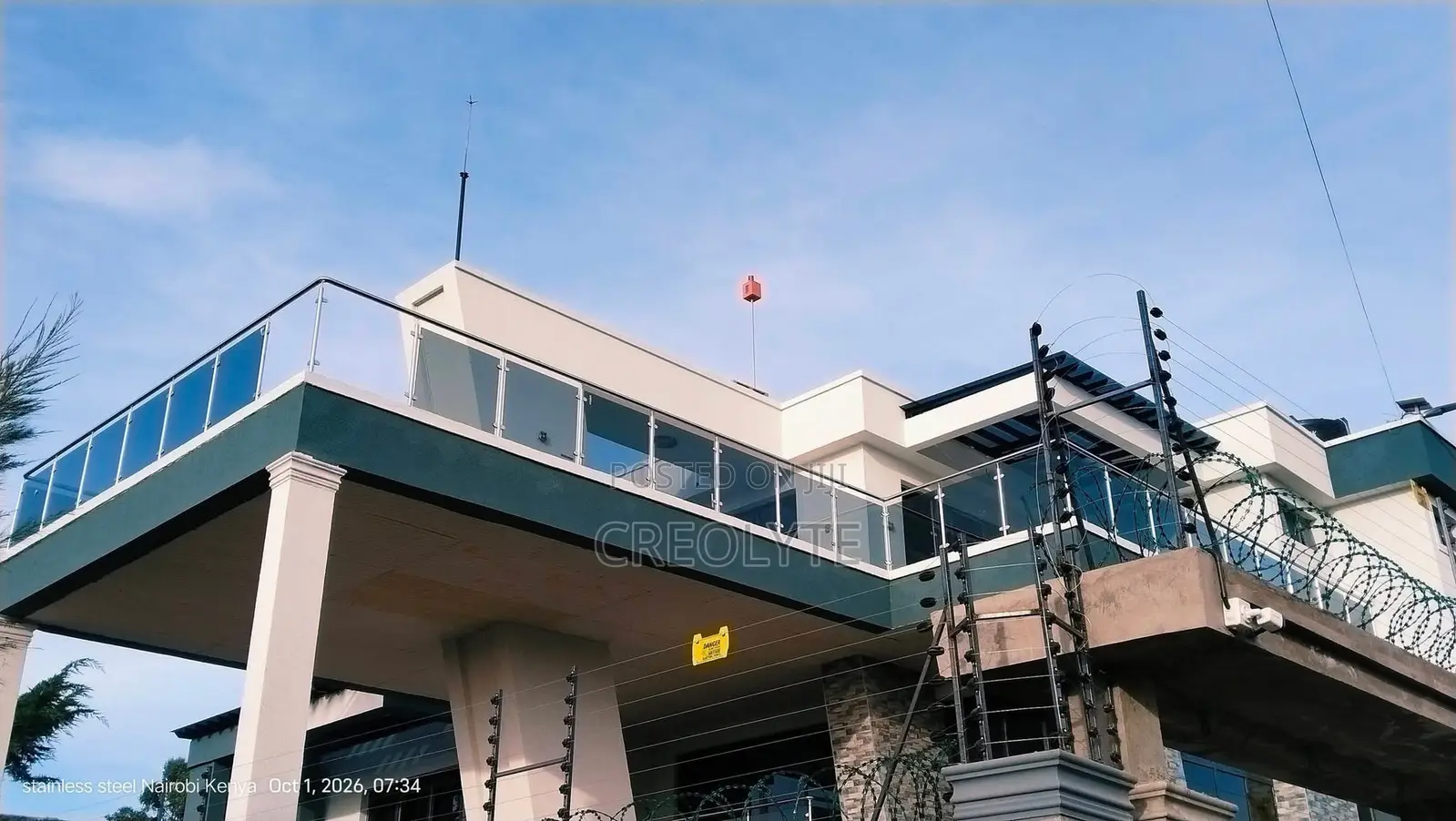 Stainless Steel & Tinted Glass Balcony Railing | Custom Balustrade |