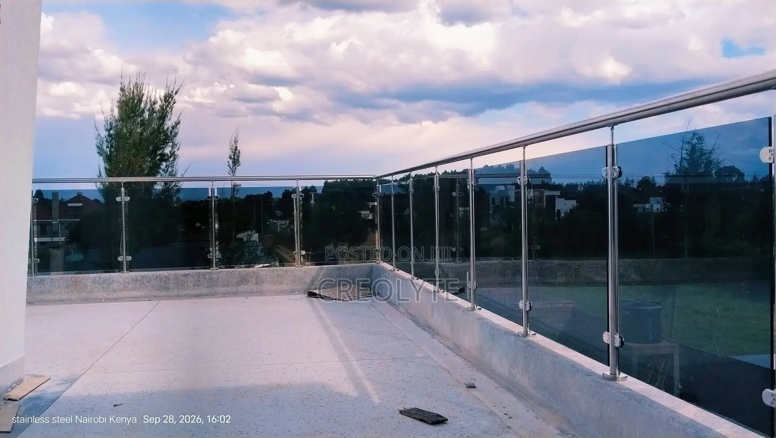 Stainless Steel & Tinted Glass Balcony Railing | Custom Balustrade |