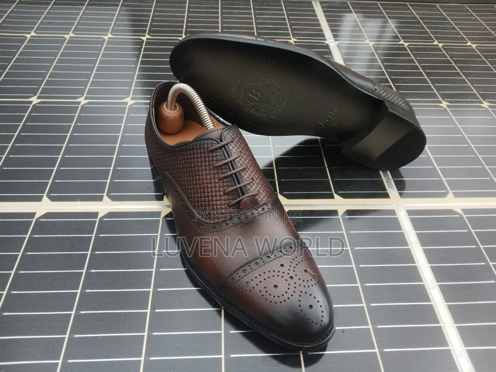 Berluti Leather Officials