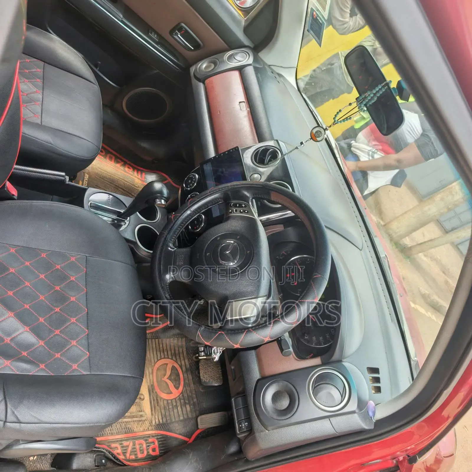 Mazda Verisa 2010 Red