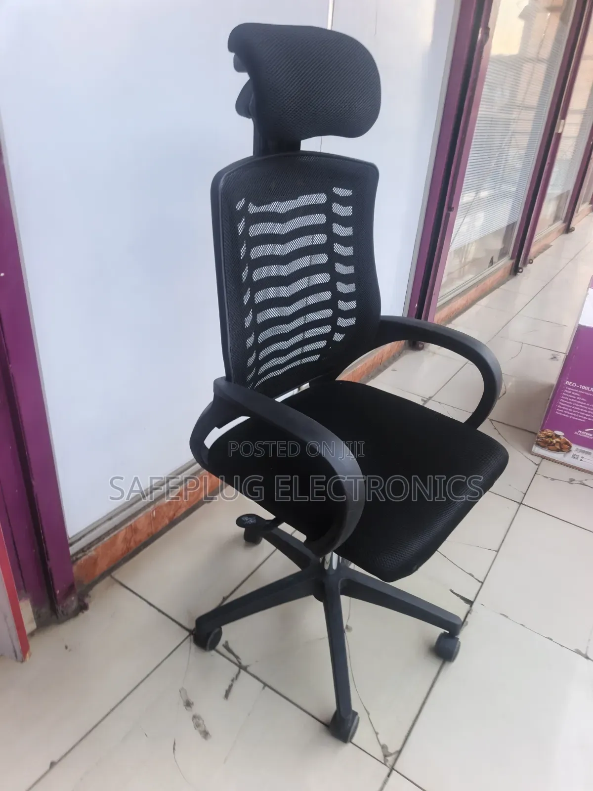 High-Back Mesh Office Chair With Adjustable Headrest