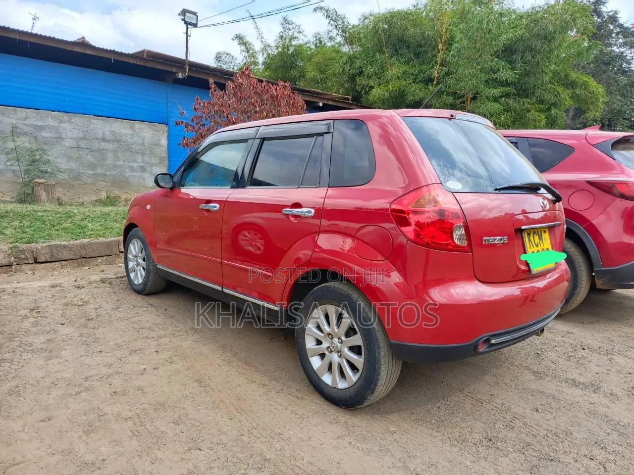 Mazda Verisa 2010 Red