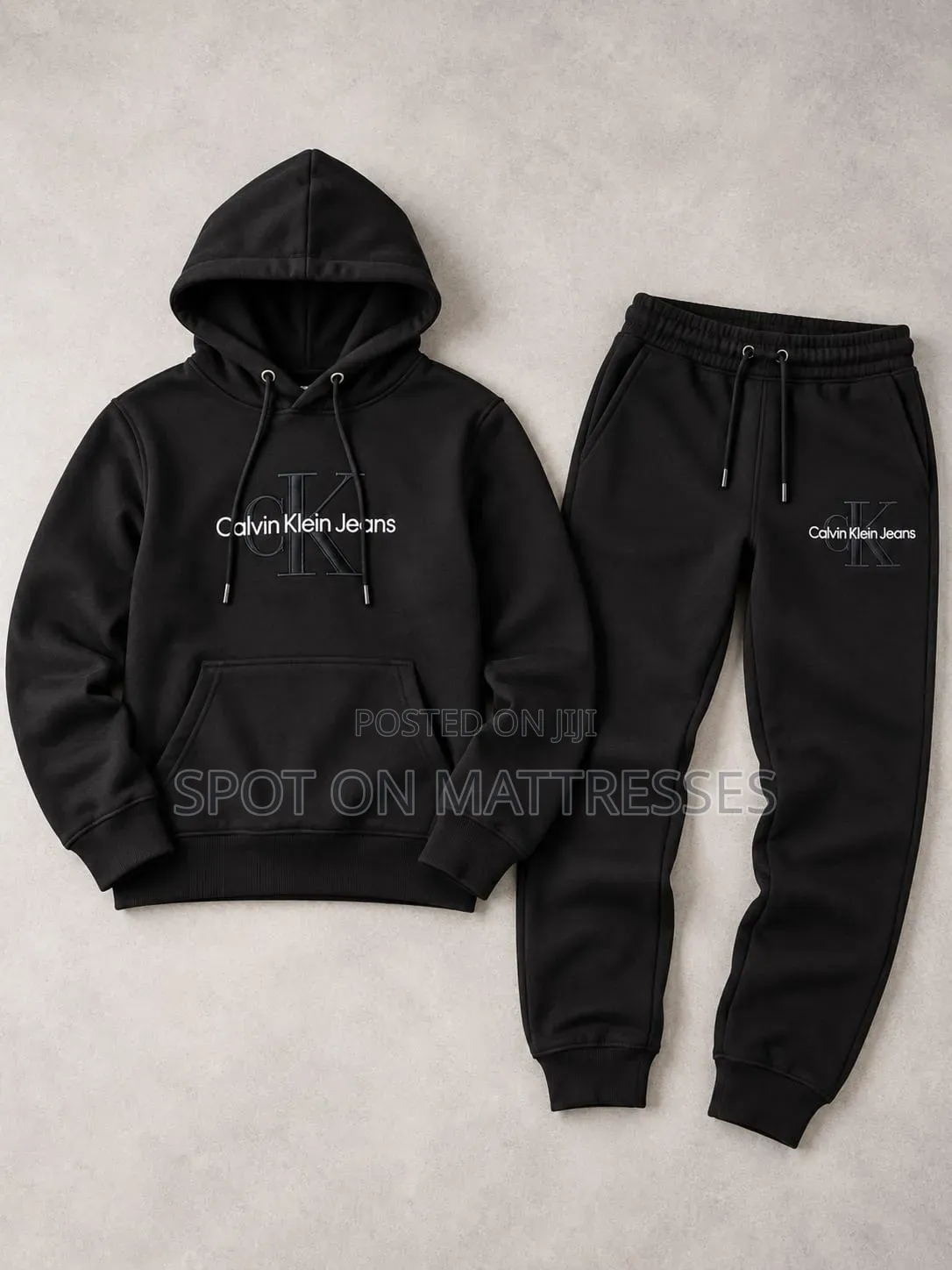 Calvin Klein Tracksuits for Boys. Colour Black and Light Grey.