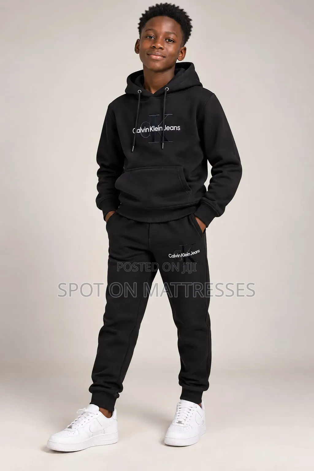 Calvin Klein Tracksuits for Boys. Colour Black and Light Grey.