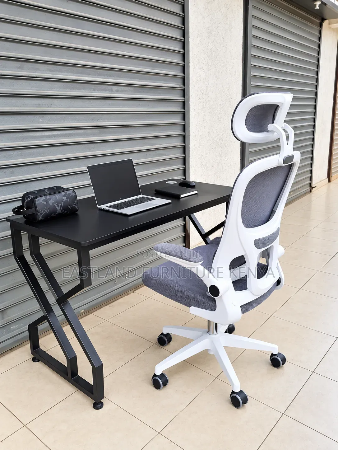 Modern Black Office Desk With White Ergonomic Mesh Chair
