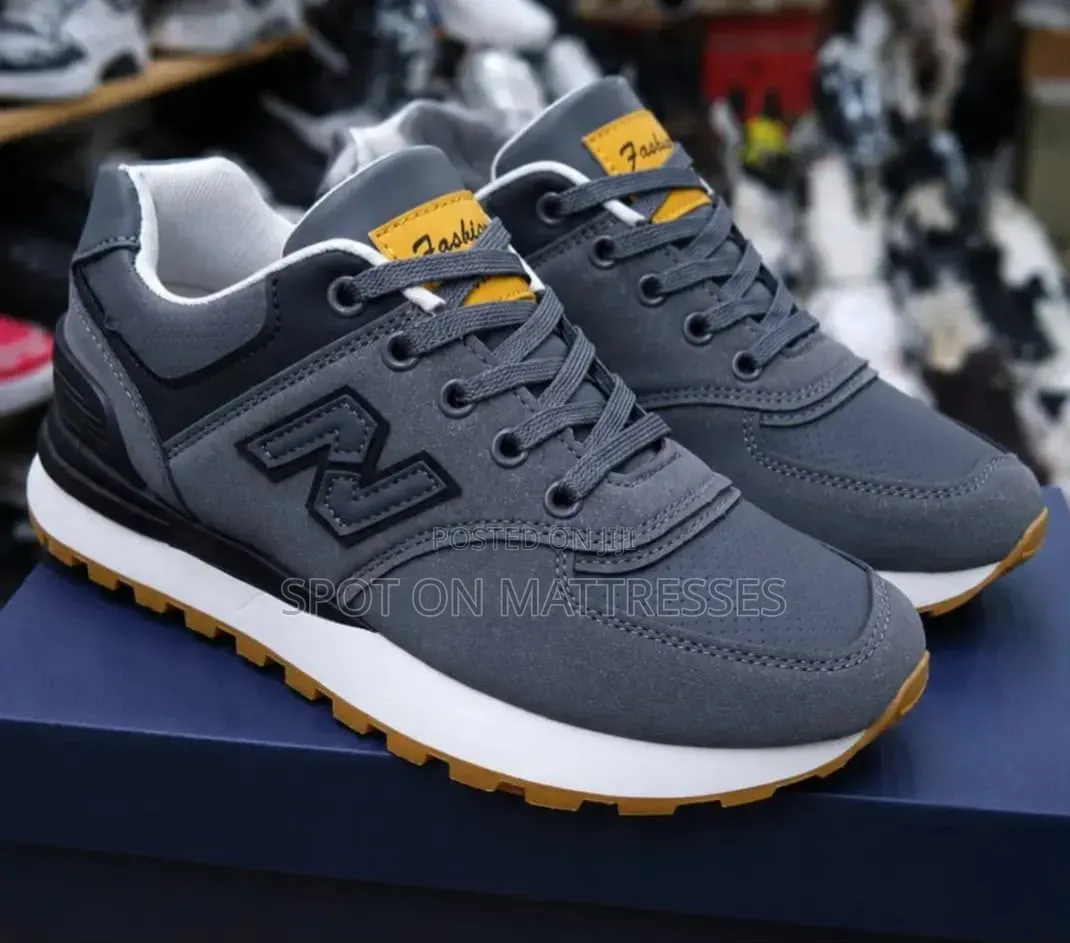 New Balance 574 for Men. Grey/Black/White. Countrywide Delivery!