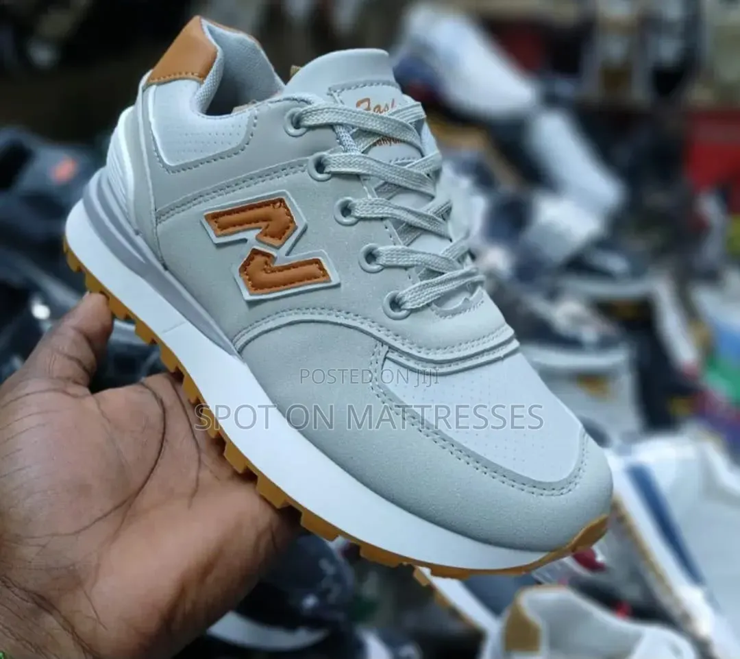 New Balance 574 for Men. Grey/Black/White. Countrywide Delivery!