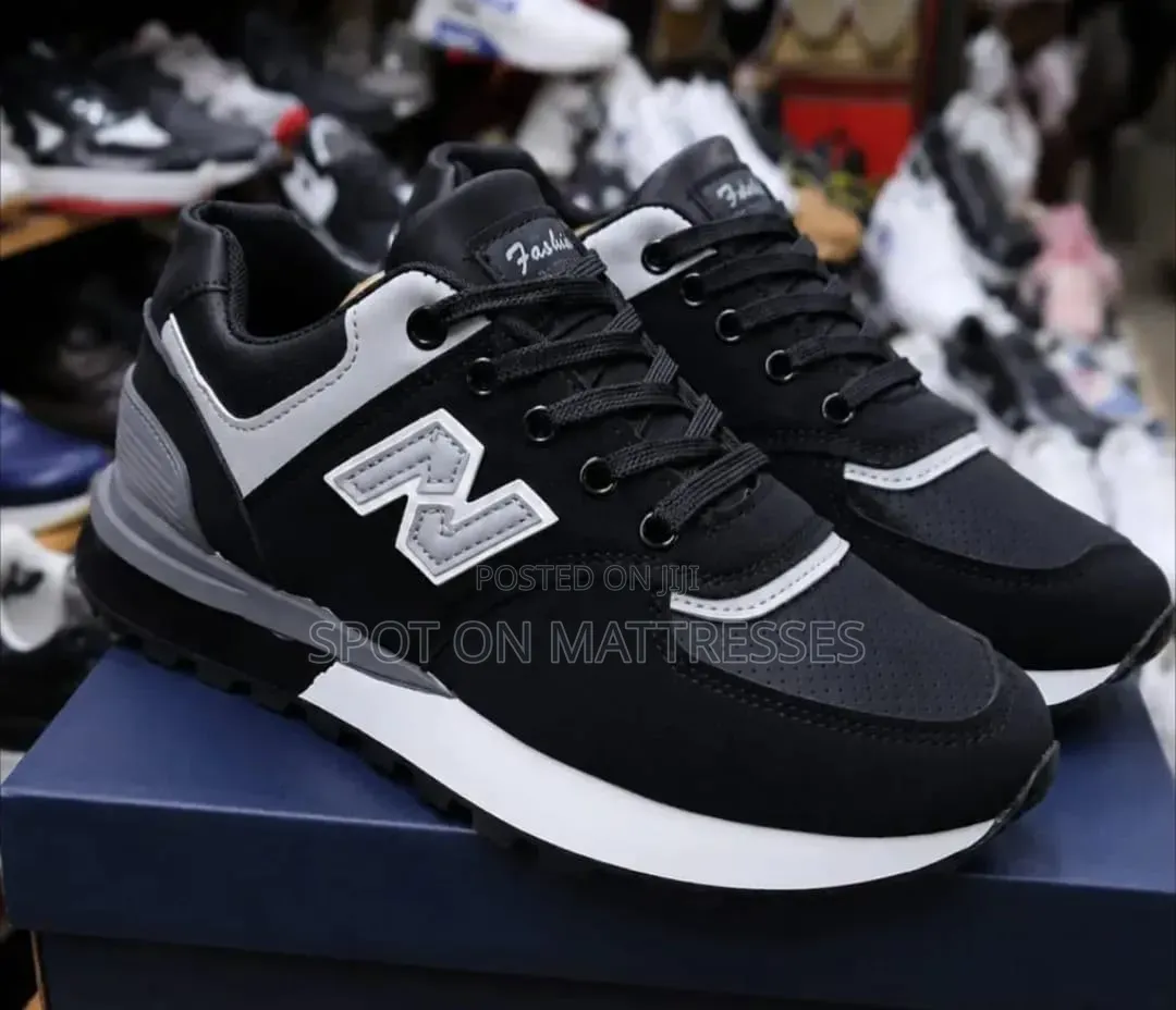 New Balance 574 for Men. Grey/Black/White. Countrywide Delivery!