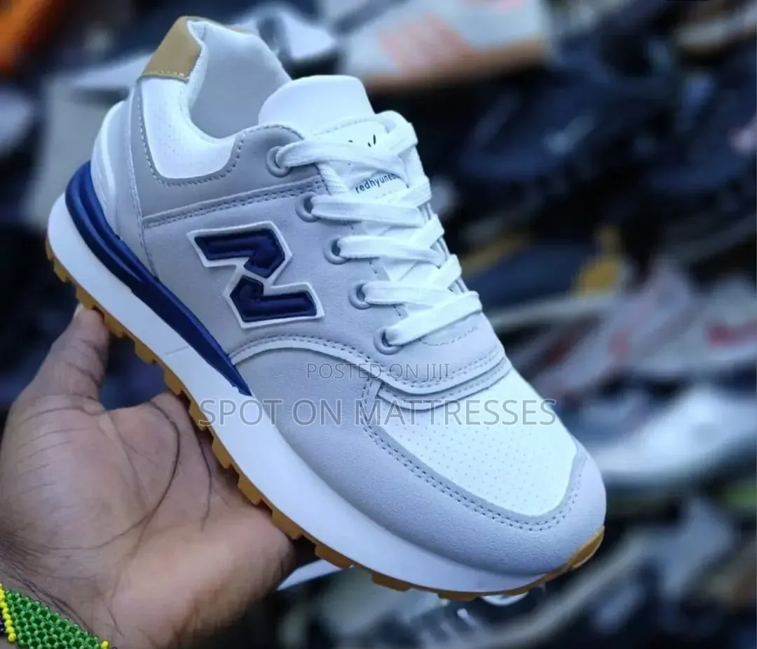 New Balance 574 for Men. Grey/Black/White. Countrywide Delivery!