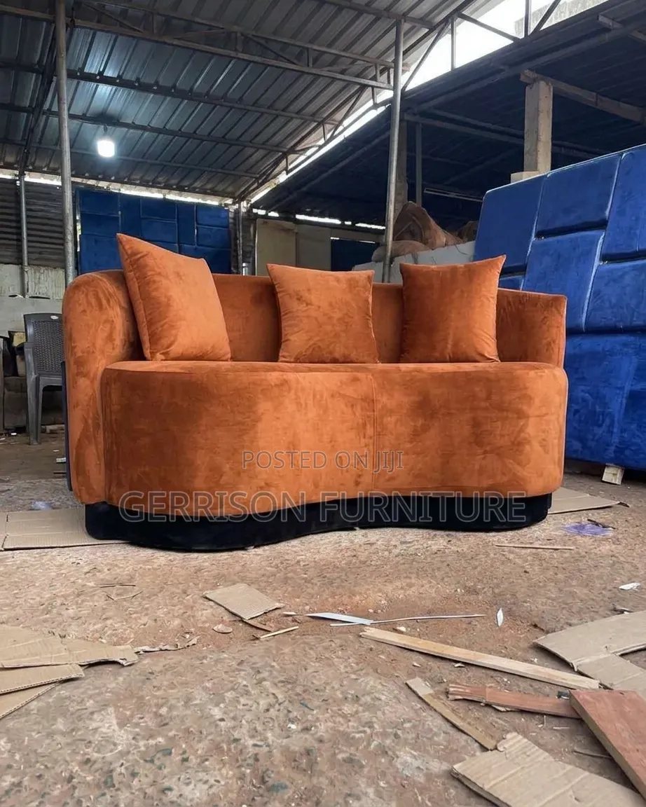 Brand New 3-Seater Curved Burnt Orange Velvet Couch With Pillows.