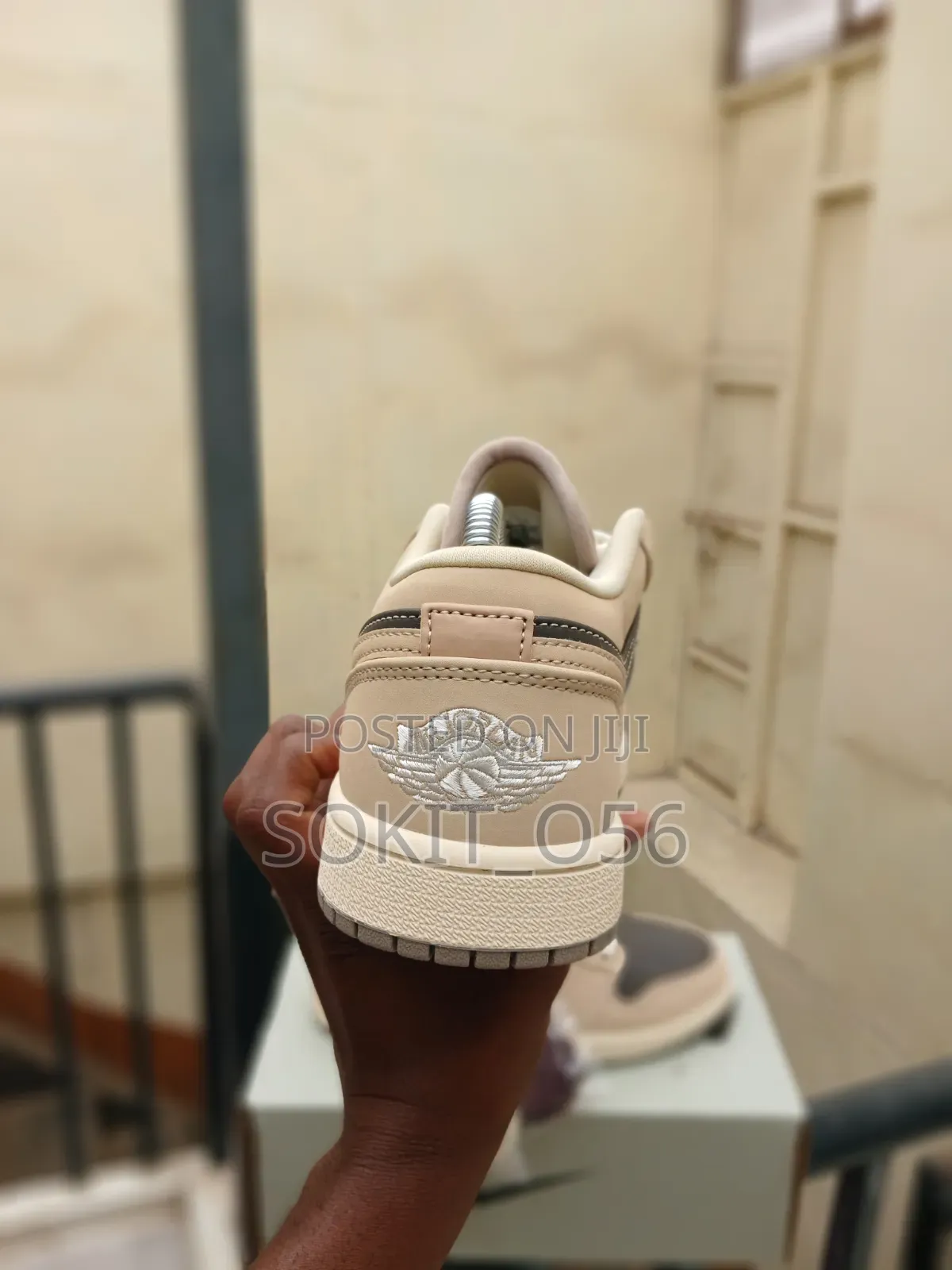 Air Jordan 1 Low SE Sneakers in a Cream-and-Brown/Mocha Colorway.