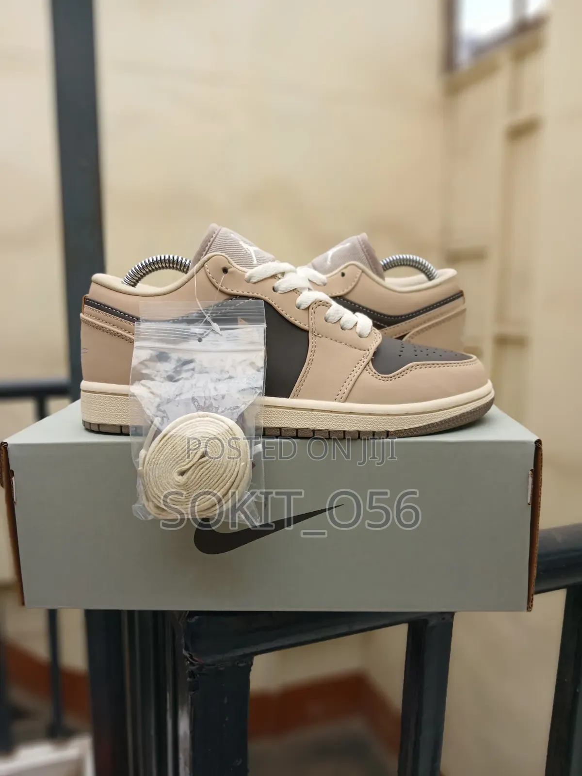 Air Jordan 1 Low SE Sneakers in a Cream-and-Brown/Mocha Colorway.