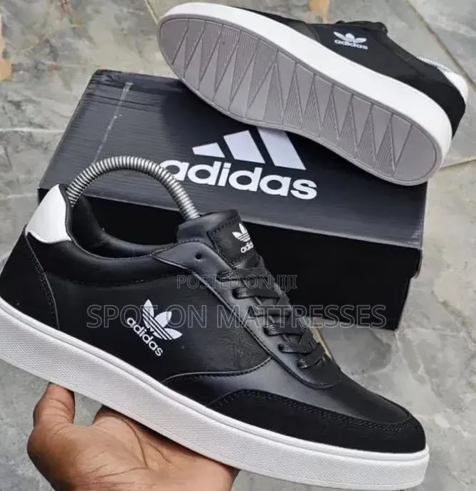 Adidas Casual Shoes for Men. Black/White and Gray. We Deliver!