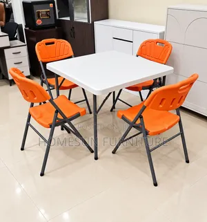 Folding Table With 4 Orange Chairs