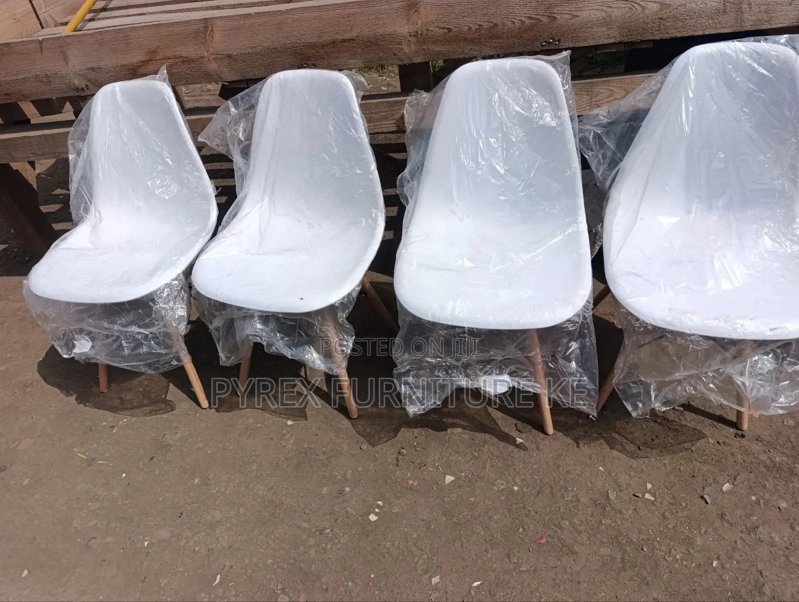 White Space Saving Eames Chairs
