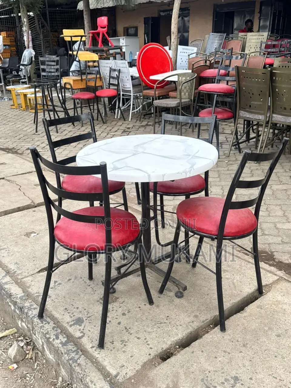 Round White Marble Table and Bar Chairs Red